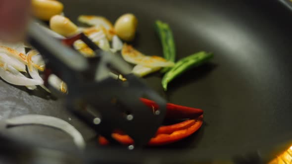 The Chef is Frying Vegetables