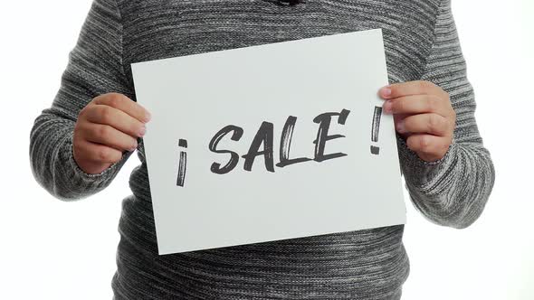 A person holding a sign with the message and the word "sale"