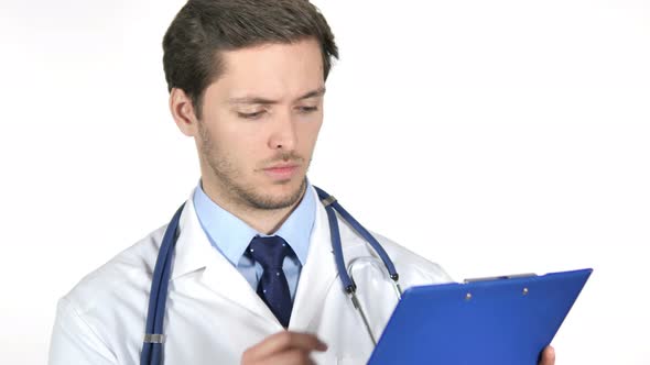 Pensive Doctor Reading Documents Isolated on White Background