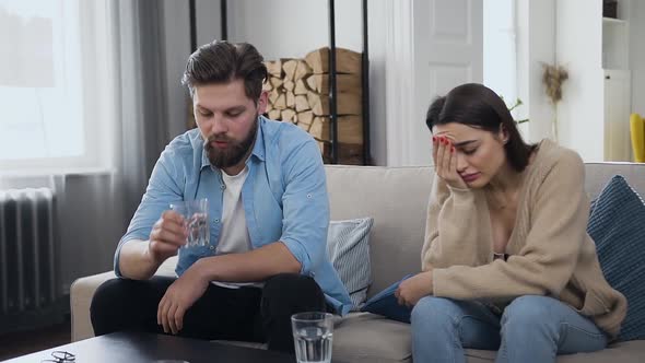 Woman Listening Her Excited Bearded Husband that Telling About Problems