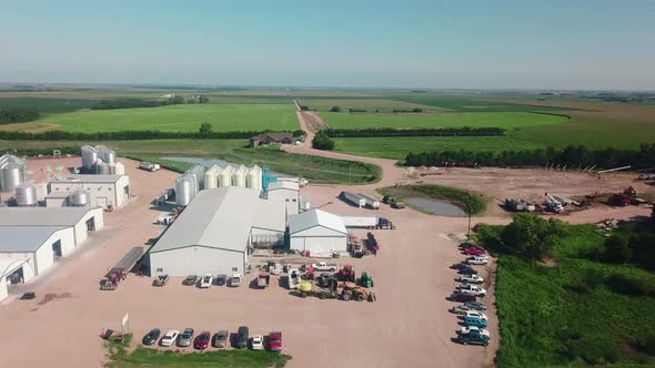 Aerial view of the storage bins, warehouses, tractors and trailers of a cover seed agribusiness in N