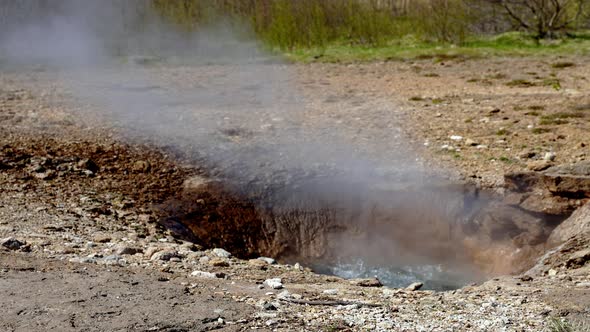 Steam Emitting From Strokkur Geyser in Iceland