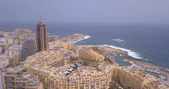 Spinola Bay with Traditional maltese Luzzu