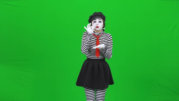 Mime Girl Trying Drink Something Disgusting. Green Screen, Chroma Key