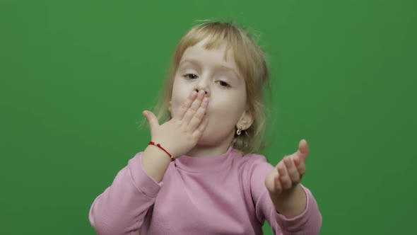 Happy Three Years Old Child. Cute Girl Smiling Giving Flying Kisses. Chroma Key