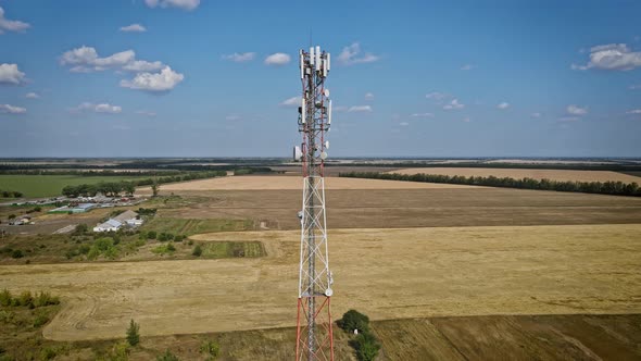 Cell site of telephone tower with 5G base station transceiver