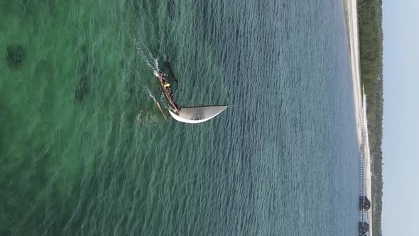 Tanzania Vertical Video  Boat Boats in the Ocean Near the Coast of Zanzibar Aerial View