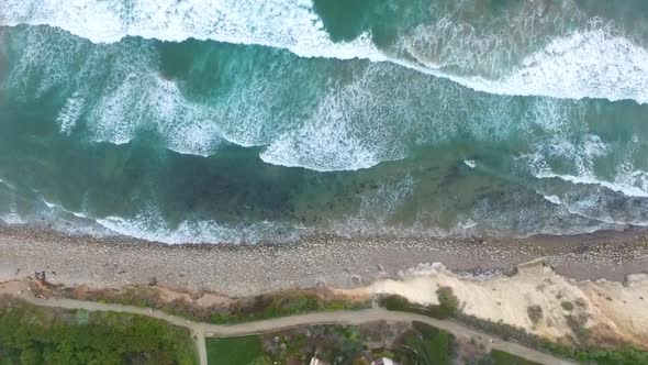 Aerial Drone Flying over Ocean Waves, Foaming and Splashing