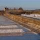 Sunset cinematic shot of salt fields after a full day of collecting salt. Salt extraction - VideoHive Item for Sale