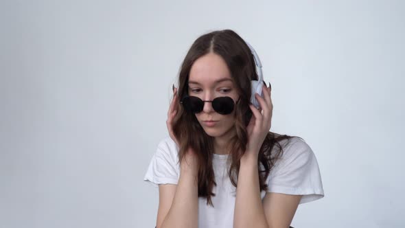 Hippie Girl Listening to Music on Headphones