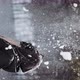 a Girl in a Balaclava Has Fun in Winter When Snow Falls on Her Head - VideoHive Item for Sale