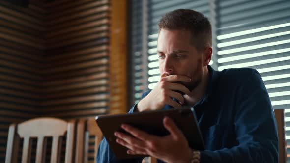 Businessman checking bitcoin price chart on digital exchange on mobile phone screen, cryptocurrency