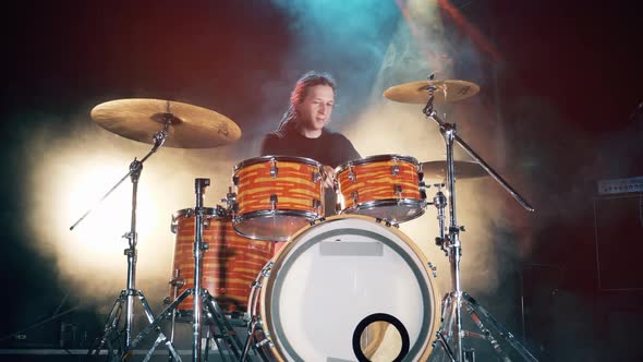 Drum Set, Drum Kit in Dark, Drummer Plays a Concert. A Man Is Enjoying His Drumming Rehearsals
