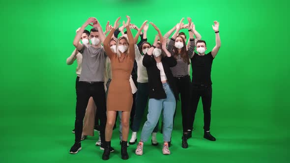 Crowd of Different People Dancing at a Concert Fans at a Music Concert They Dance and Clap Their