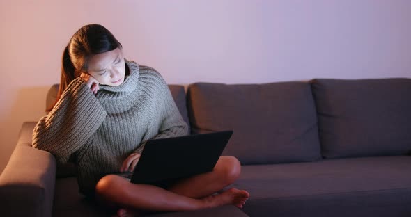 Woman use of laptop computer at home