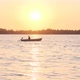 Man sailing in a boat at sunset - VideoHive Item for Sale