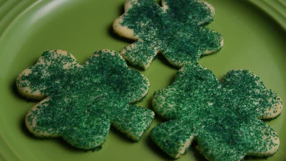 Cinematic, Rotating Shot of Saint Patty's Day Cookies on a Plate 