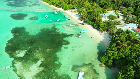 Aerial drone shot nature of relaxing bay beach trip by aqua blue ocean with white sand background of