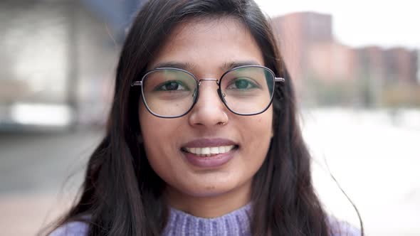 Happy Indian Girl Smiling on Camera Outdoor