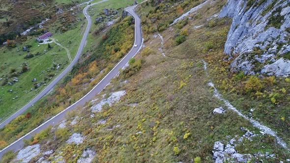 Aerial view of curvy roads found along Klausenpass, Switzerland during fall. 