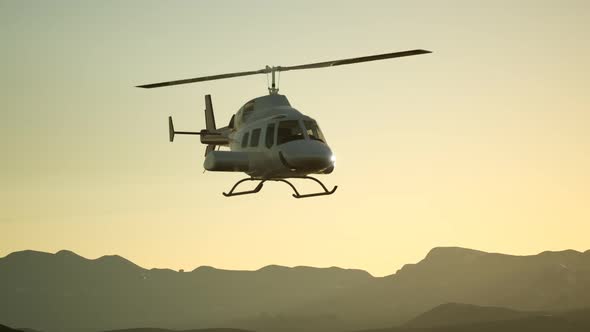 Extreme Slow Motion Flying Helicopter and Sunset Sky