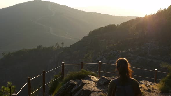 Woman girl hiking in nature landscape viewpoint in Mondim de Basto, Portugal