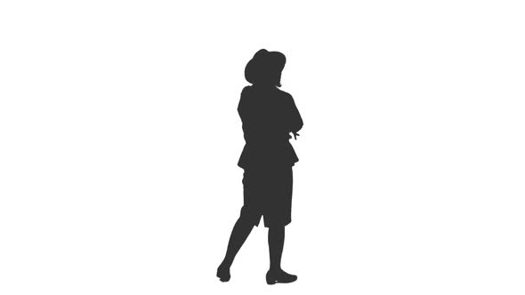 Silhouette of Elegant Female Tourist in Hat Watching Something