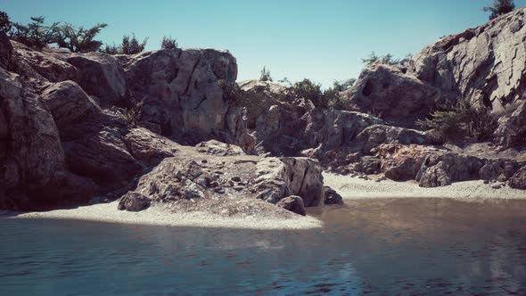 Coastal View of a Sand Beach with Cliffs