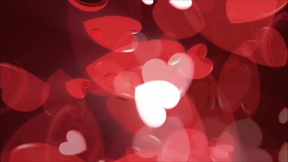 Abstract red hearts on dark background.