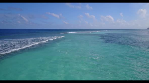 Aerial drone view travel of relaxing coastline beach lifestyle by turquoise sea with white sandy bac