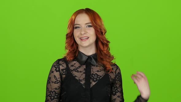 Girl Flirts and Sends Air Kisses To Everyone Around Her, Green Screen, Slow Motion