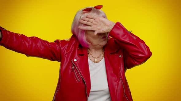 Trendy Positive Elderly Woman Having Fun Dancing Dabbing Raising Hands Making Dubdance Gesture