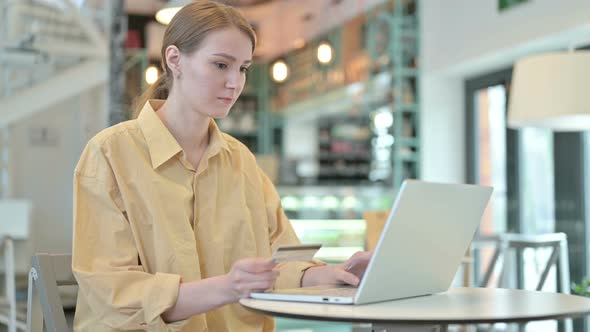 Online Payment Failure on Laptop By Young Woman 