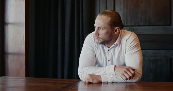 Nervous Man Before Interview in Office