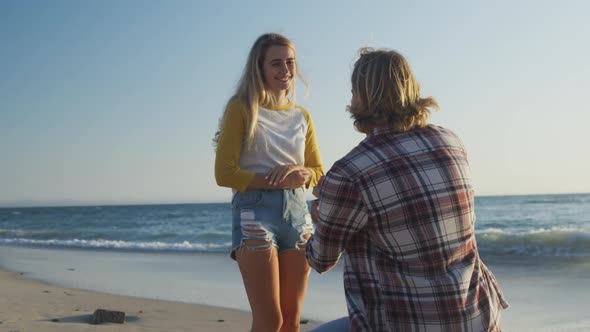 Caucasian couple enjoying their time seaside