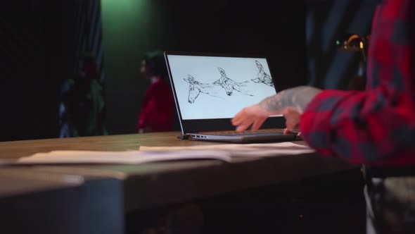 Girl Draws a Picture From the Laptop Screen. Close-up