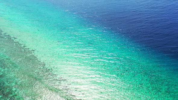 Aerial texture of idyllic sea view beach time by blue sea and white sandy background of a dayout nea