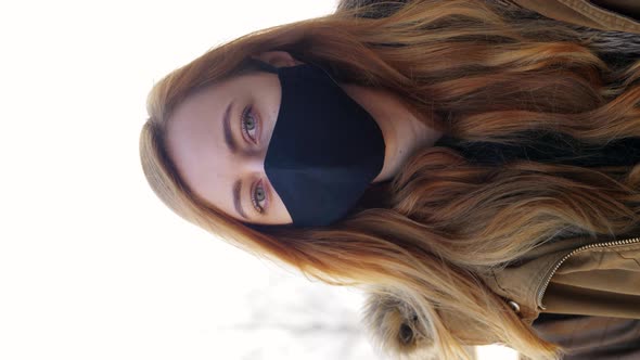 Woman Wearing Protective Reusable Barrier Mask