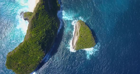 Aerial drone view of a secluded deserted beach coastline