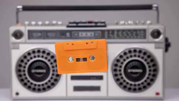 Cassette Tape Coming Out of Stereo Hifi
