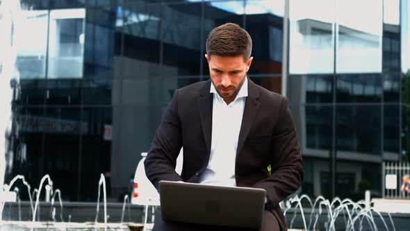 Businessman using laptop