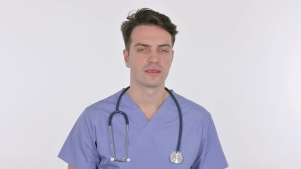 Denying Gesture By Young Doctor on White Background