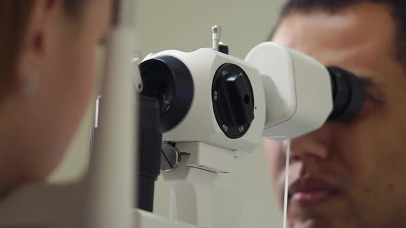 Close Up Shot of a Man's Face People Working As an Ophthalmologist