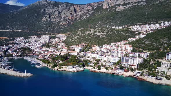 The top view from the drone of Kas resorts, bay, yahts, city in Mugla in Turkey