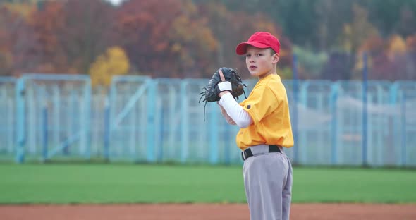 Baseball at School the Pitcher Pitches Fastball Toward Batter Young Boy Throwing the Ball Slow