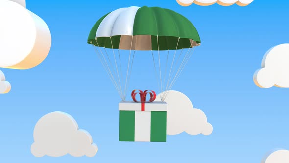 Box with Flag of Nigeria Falls with a Parachute