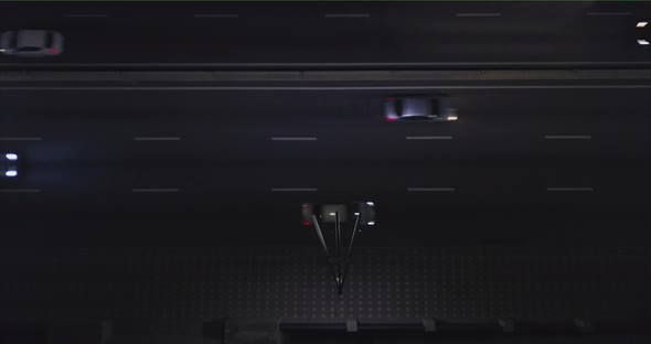 A View From a Drone on the Road at Night