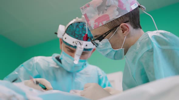 Medical specialists in surgical masks and uniform