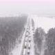 Trucks are Stuck in Traffic on a Snowcovered Highway - VideoHive Item for Sale