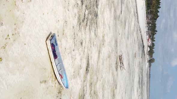 Vertical Video of Low Tide in the Ocean Near the Coast of Zanzibar Tanzania Aerial View